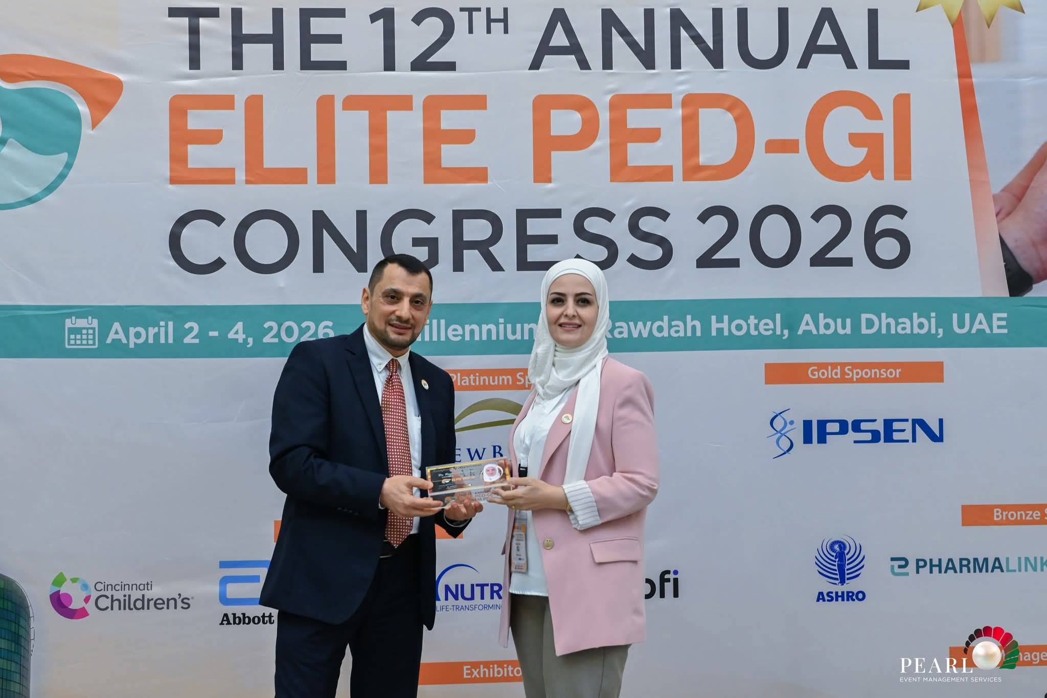 Dr. Raghad receiving recognition
