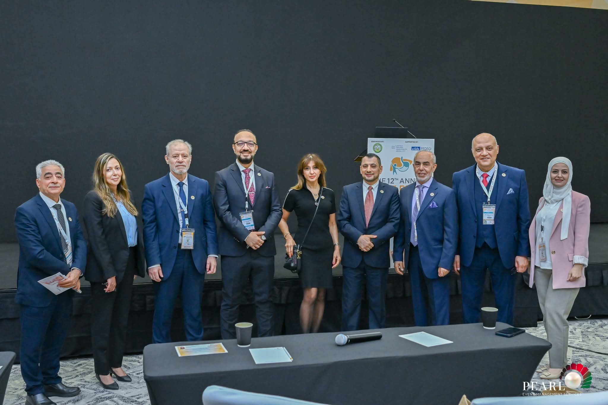 Dr. Raghad with congress moderators and faculty